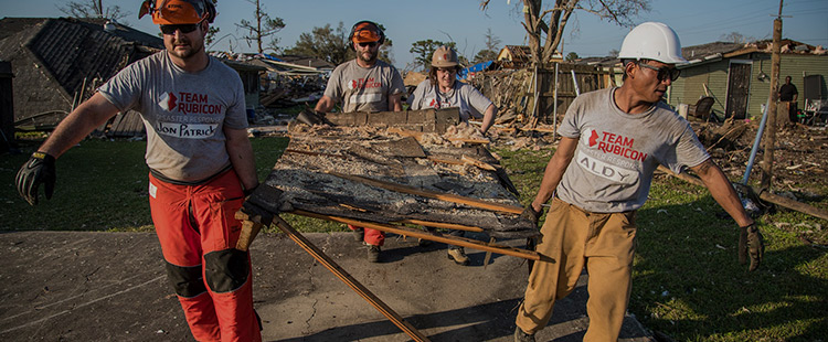 Team Rubicon volunteers helping to clear rubble