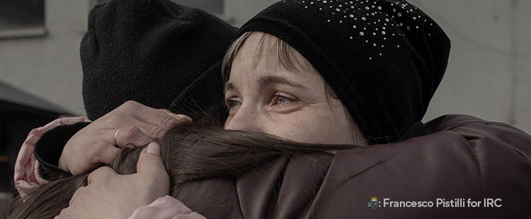 Photo of two women hugging in Ukraine