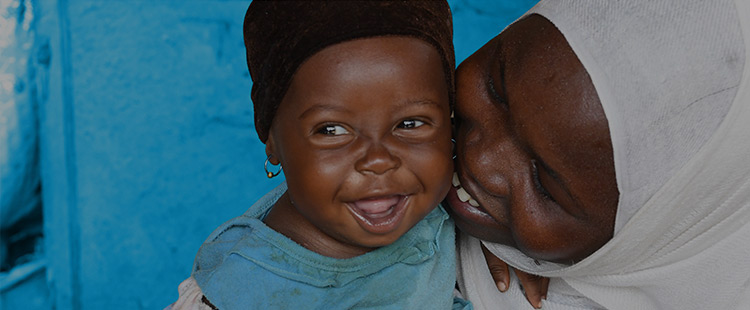 Photo of smiling mother and child
